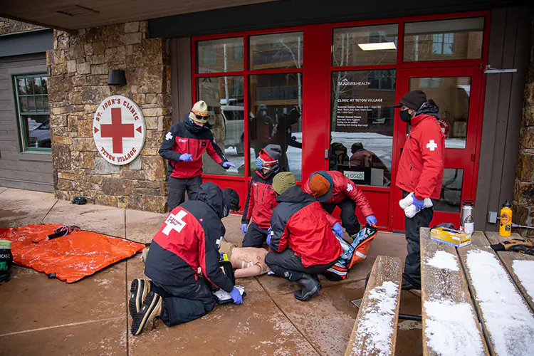 Medical professionals practice an emergency outside the St. John's Clinic in Teton Village, WY.