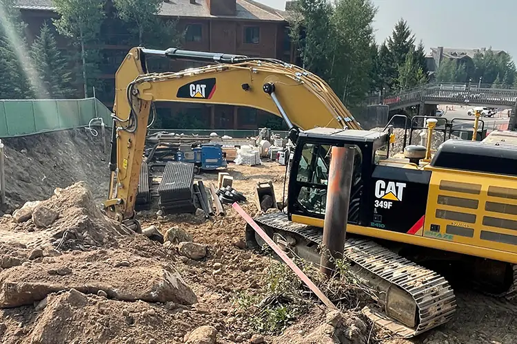 Construction equipment working on a road in Teton Village, WY.